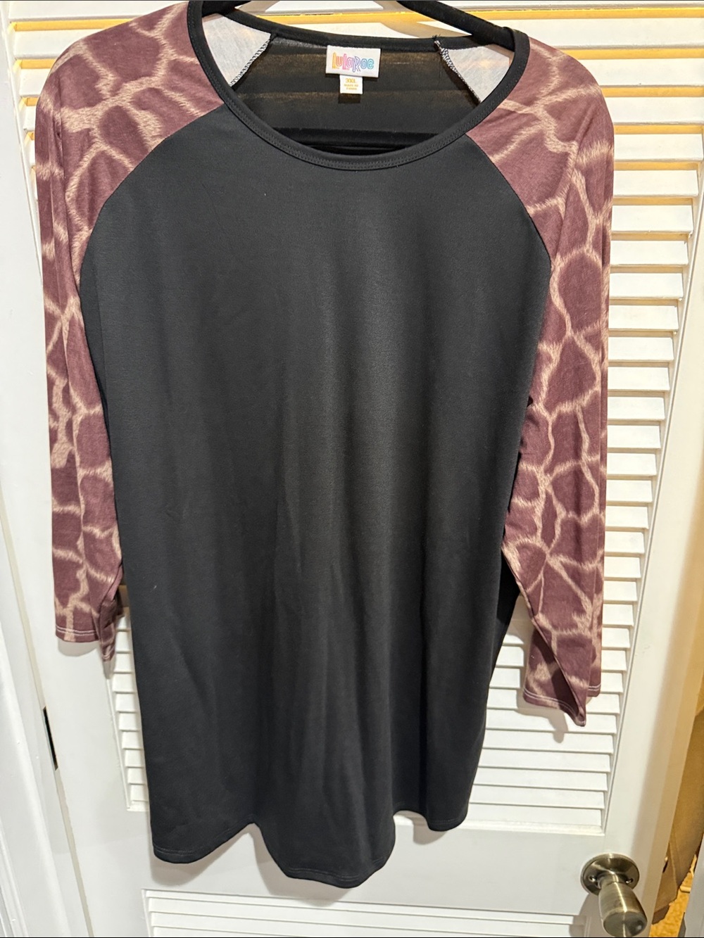 LuLaRoe Black Top with Mauve Animal-Print Sleeves